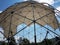 Geodesic dome with metal poles and triangles