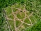 Geoglyph in the form of an atom symbol, an outline where trees are planted, aerial view. District of the city of Balabanovo,