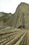 Geological Formations In Beach And Mountain Of Flysch Type Geopark Basque Route UNESCO. Filmed Game Of Thrones. Itzurun Beach. Geo