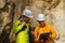 Geologists against the rocks in the canyon