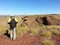 Geologists sampling rocks on hills