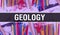 Geology with School supplies on blackboard Background. Geology text on blackboard with school items and elements. Back to School