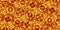 Geometric African pattern. Colorful and seamless image. Golden yellow, orange, and red colors