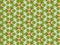 Geometric background from flowers color. Uniform pattern.