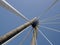 Geometric close up of the supports and cables of the suspension bridge in southport merseyside against a blue sky