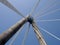 Geometric close up of the supports and cables of the suspension bridge in southport merseyside against a blue sky