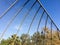 Geometric design element fence and blue sky