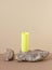 Geometric minimalist composition with natural material stone and bright modern yellow geometric shapes,