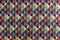 Geometric multicolored textile background pattern