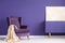 Geometric painting on a purple cabinet in elegant living room in