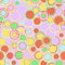 Geometric seamless pattern. The colorful multicolored circles and rings of different sizes, are located in a chaotic manner.