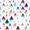 Geometric seamless pattern with multicolored triangle shapes on white background