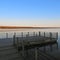 Geometric shape dock and railings on calm Cayuga Lake