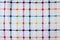 Geometric shaped textile background. Multicolored fabric texture