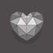 Geometric symmetrical heart of triangles of different shades of gray.