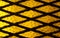 Geometrical Metal Grate and Yellow Decorative Glass