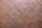 geometrical square semi smooth pale terracotta tiles background floor close up