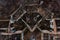 geometry of the walls of an abandoned hospital building among greenery. Vertical down view from the drone