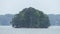 Georgia, Buford Dam Park, A close view of the dome shaped island with people kayaking around it