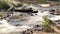 Georgia Hurricane Shoals Park  A view of a small waterfall with rocks on the North Oconee River