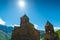 Georgia, view of the Trinity Church in the village of Gergeti on a background of mountains