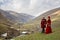 Georgian couple in traditional clothes in Caucasus Mountains, Ushguli,, Georgia