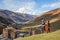 Georgian couple in traditional clothes in Caucasus Mountains, Ushguli,, Georgia