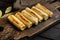 Georgian crepes stuffed on old dark  wooden table background