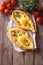 Georgian khachapuri and fresh vegetables vertical top view