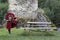 Georgian man plays local musical instrument of panduri and sings traditional svanetian songs in Ushguli, Caucasus Mountains, Georg