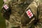 Georgian patch flag on soldiers arm. Georgia army uniform. Georgia troops