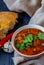 Georgian soup kharcho with lavash. National dish of Georgian harcho. Soup kharcho with cilantro and vegetables on a