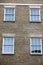 Georgian windows architecture on a wall house, London