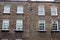 Georgian windows architecture on a wall house, London, UK