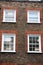 Georgian windows architecture on a wall house, London, UK