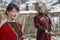 Georgian young couple in their traditional local costumes in Ushguli, Georgia.