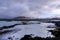 Geothermal power plant next to lagoon water