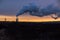 Geothermal power station in Iceland. Icelandic steam during sunset