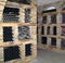 Gerakini, Greece- may 29, 2007: Wine cellars with old aged wine, bottles of wine