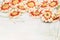 Gerbera flowers border on light shabby chic background