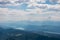 Gerlitzen - Panoramic view of Lake Ossiach surrounded by majestic mountain peaks of Karawanks and Julian Alps