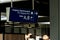 German airport dusseldorf exit and baggage claim blue sign gates A and B