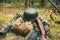 German Ammunition Of World War II On Ground. Military Helmet, Lights, Rifle