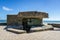 German Blockhaus and 50 mm anti tank gun at St Aubin-sur-Mer, World War 2 Atlantic Wall remnant, Normandy