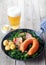 German Cuisine with Mustard and Beer on Side