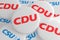 German Election Politics Badges: Pile of Buttons With The Logo of The Political Parties CDU And CSU, 3d illustration