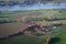 German farm close to the river Rhine seen from the air