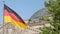 German Flag In Front of The Reichstag in Berlin, Germany Fluttering In The Wind