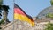 German flag in front of the Reichstag in Berlin, Germany fluttering in the wind