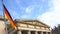 German flag outside The Neue Wache, New Guardhouse, Mitte District, Berlin, Germany